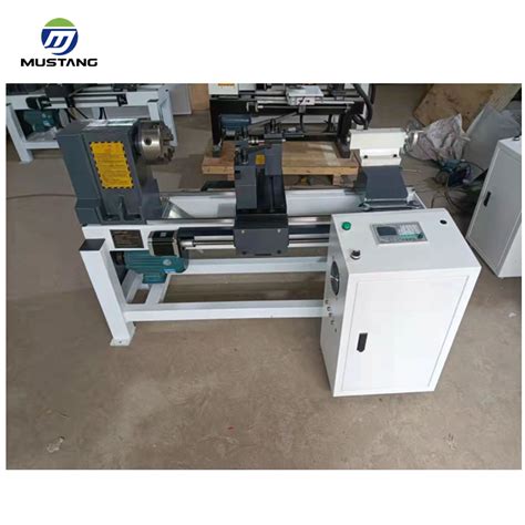 cnc wood lathe machine|Multifunctional CNC Wood Lathe with Automatic Feeder.